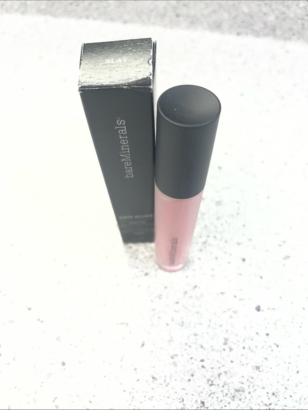 bareMinerals Strength & Length Lipgloss in Soft Pink Color on box Slay
